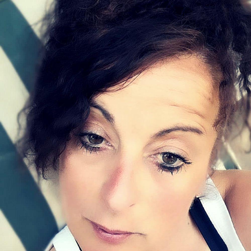 Woman wearing Avon Mascara