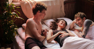  three people in the bedroom